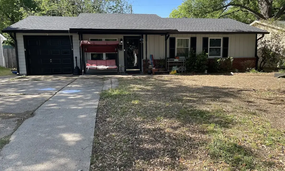 Asphalt Shingle Roof Repair crew at work on a residential roof in Courtland